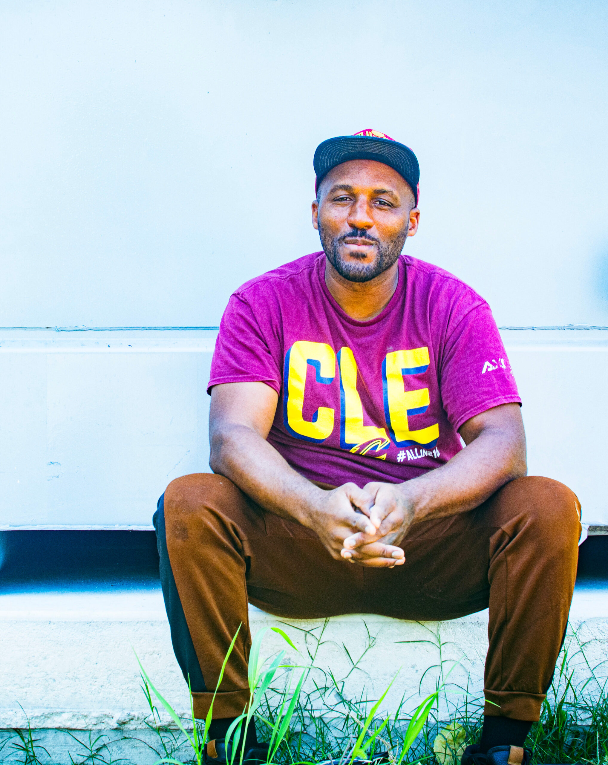 farmer posing with cleveland t-shirt